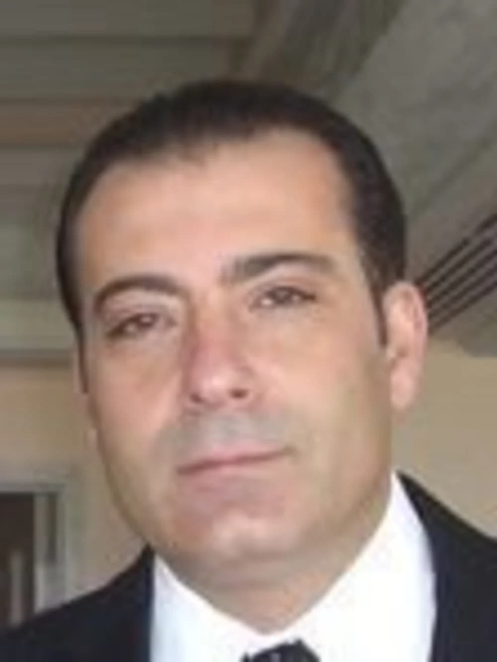 Portrait of Hekmat Kordab